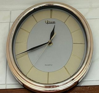Reloj de pared ovalado Luxisal