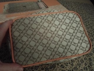 Neceser Carolina Herrera Beige Monogram