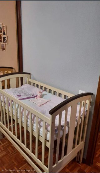 Cuna de bebé con balanceo