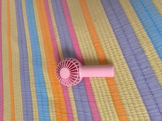 Mini ventilador rosa portátil