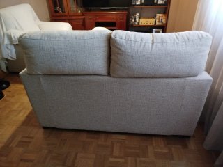 Sofá y sillón beige tela