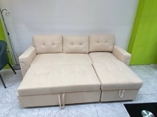 Sofá cama beige con arcón