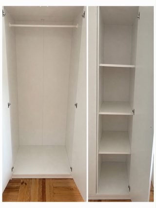 Armarios blancos de metal y madera