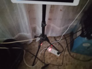 Trípode ajustable