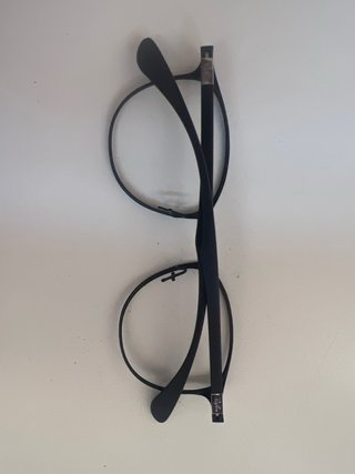 Montura de gafas Ray-Ban negras y doradas