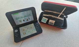 Nintendo 3DS XL Negra/Roja + 9 Juegos