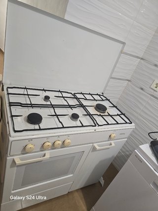 Cocina de gas 4 fuegos con horno