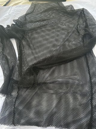 Top/Blusa negra de rejilla transparente