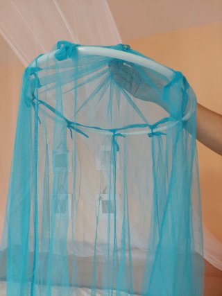 Mosquitera azul para cama