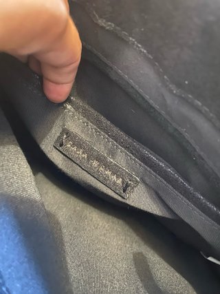 Bolso Zara negro con tachuelas y cadena