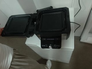 Olla Eléctrica Multifunción Negra y Plateada