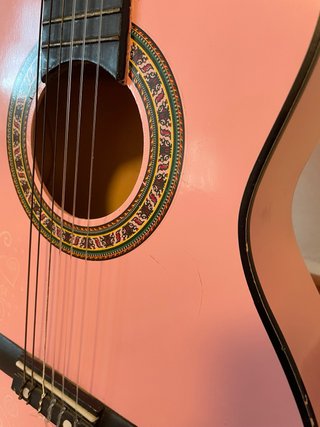 Guitarra infantil rosa