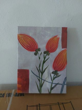 Cuadro de flores naranjas y rojas
