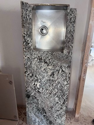 Encimera de granito gris y blanco