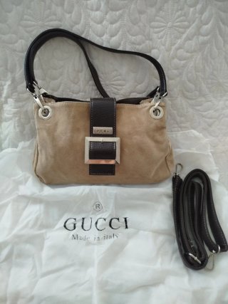 Bolso Gucci con su Guardapolvo y otro de Moschino