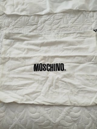 Bolso Gucci con su Guardapolvo y otro de Moschino
