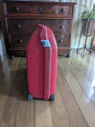 Maleta Samsonite Oyster rígida 65L. Color rojo