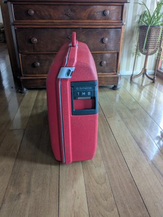 Maleta Samsonite Oyster rígida 65L. Color rojo