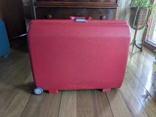 Maleta Samsonite Oyster rígida 65L. Color rojo