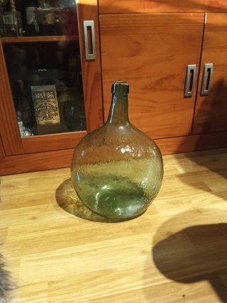 Damajuana de vidrio verde