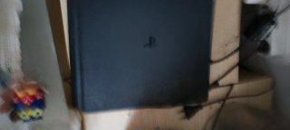 PS4 Slim 1TB + 2 mandos + 4 juegos