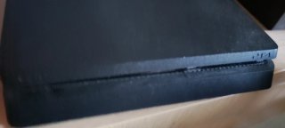 PS4 Slim 1TB + 2 mandos + 4 juegos