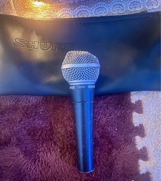 2 Micrófonos Shure SM58 con funda original.