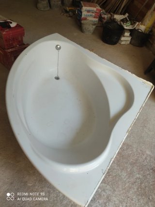 Bañera esquinera.