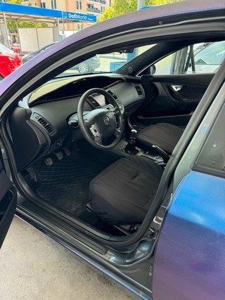 nisan primera p12
