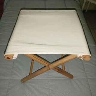 Banqueta auxiliar de bambú y tela
