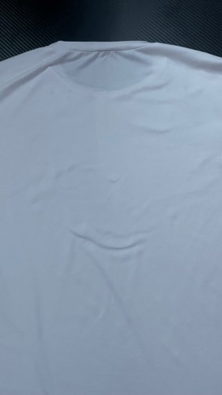 Camiseta blanca con palmera y ola