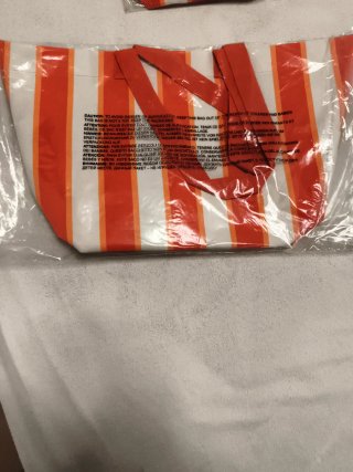 Bolsa de playa Lancaster rayas naranja y blanco,