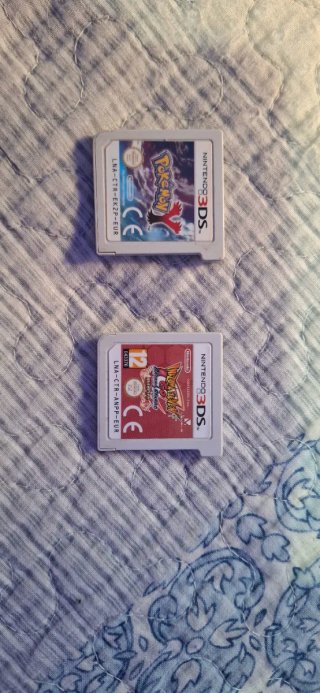 Nintendo 3DS XL Rossa + 2 Giochi + caricatore e stilo