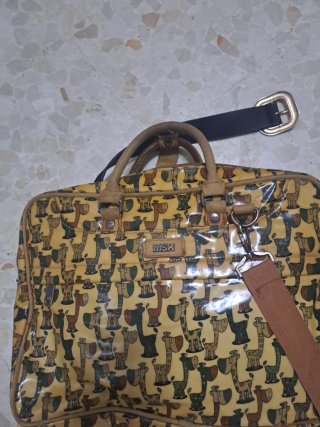 Bolso ordenador MSK amarillo estampado jirafas