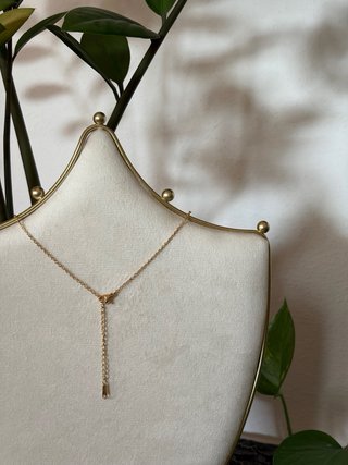 Collana fatta a mano con ciondolo a ciambella