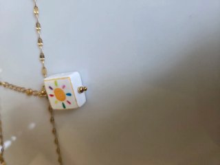 Collar con colgante de sol