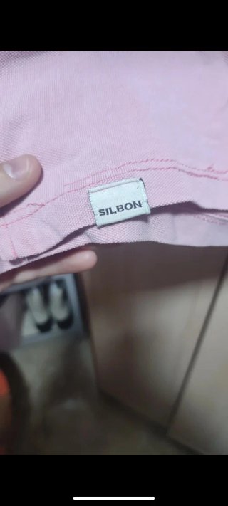 Polo rosa con logo