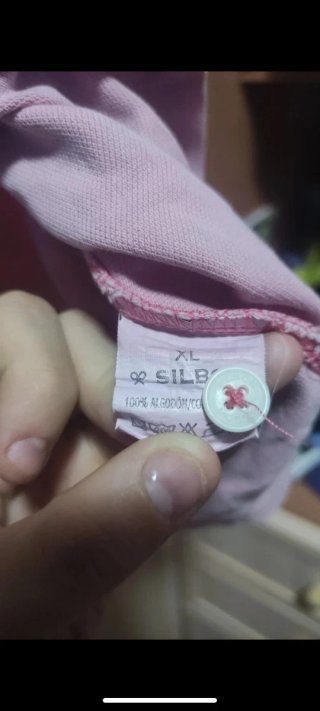 Polo rosa con logo