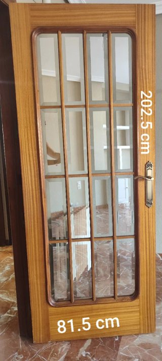 Puerta madera acabado barnizado