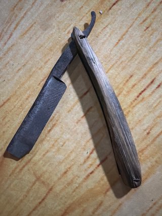 Máquina de cortar pelo antigua