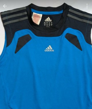 Camiseta sin mangas Adidas azul. Talla 14-15 años