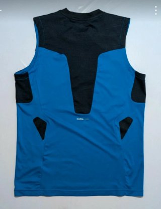 Camiseta sin mangas Adidas azul. Talla 14-15 años
