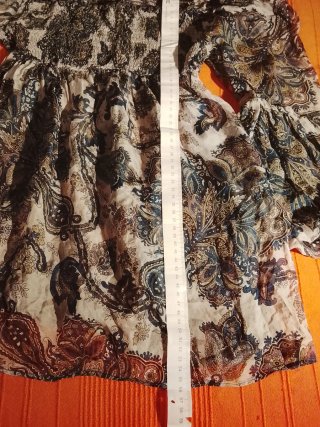 Blusa fina estampada manga acampanada