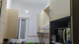 Muebles de cocina con vitrocerámica y osmosis