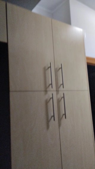 Muebles de cocina con vitrocerámica y osmosis