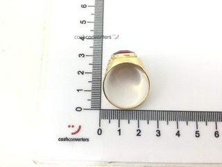 sello oro 18k con rubi