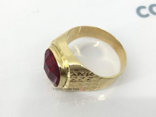 sello oro 18k con rubi