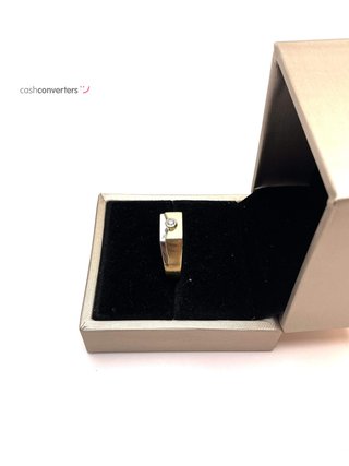 sello oro 18k con diamante