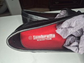 Mocasines negros de piel con flecos