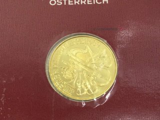 moneda oro 24k con 0